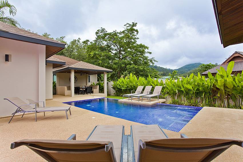 Sun bed near the pool Of Sri Nin Pool Villa