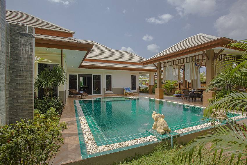 The pool is decorated with trees and sculpture Of Thammachat P3 Vints No.130