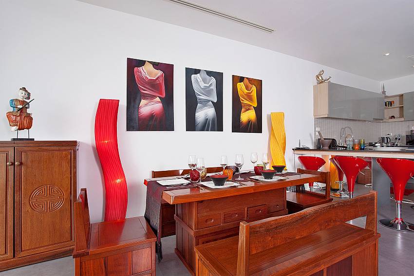 Dinning table is decorated with picture Of Seductive Sunset Villa Patong A7