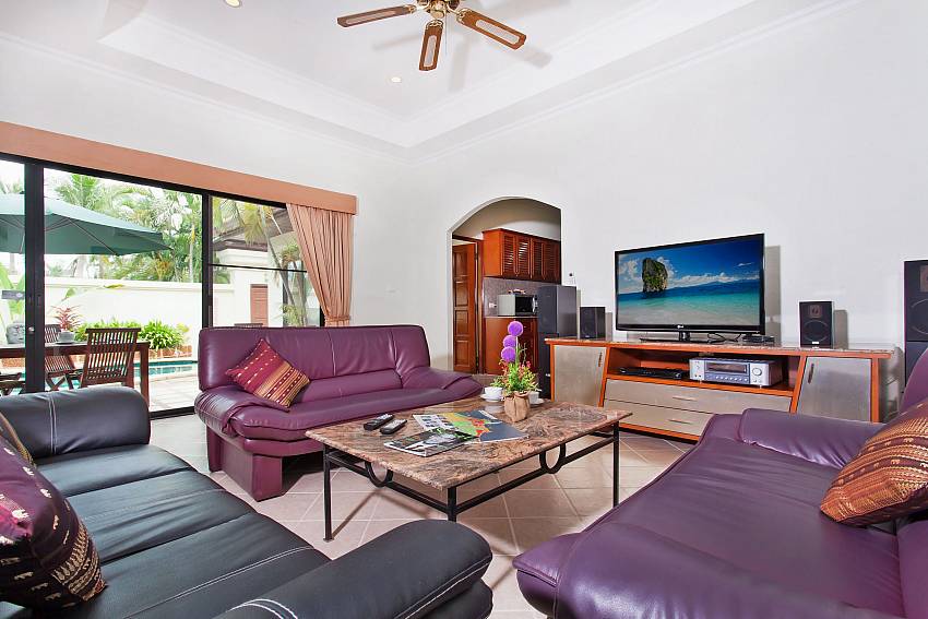 Living room see view with TV Of Serene Pool Villa