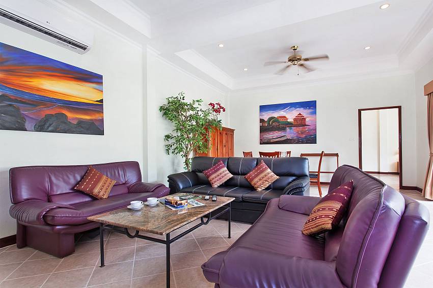 Living room is decorated with picture Of Serene Pool Villa