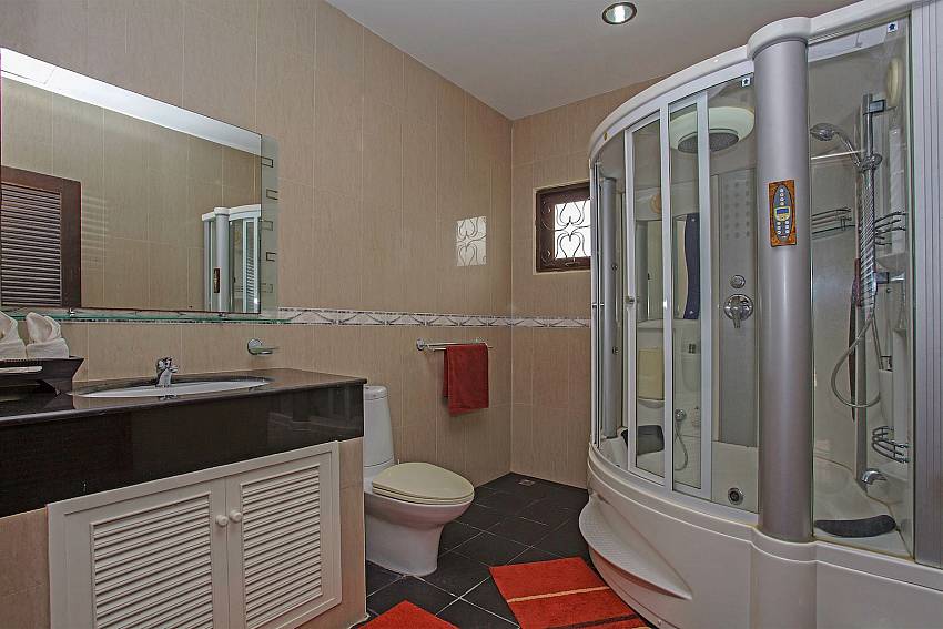 Bath mirror with toilet of Tranquillo Pool Villa