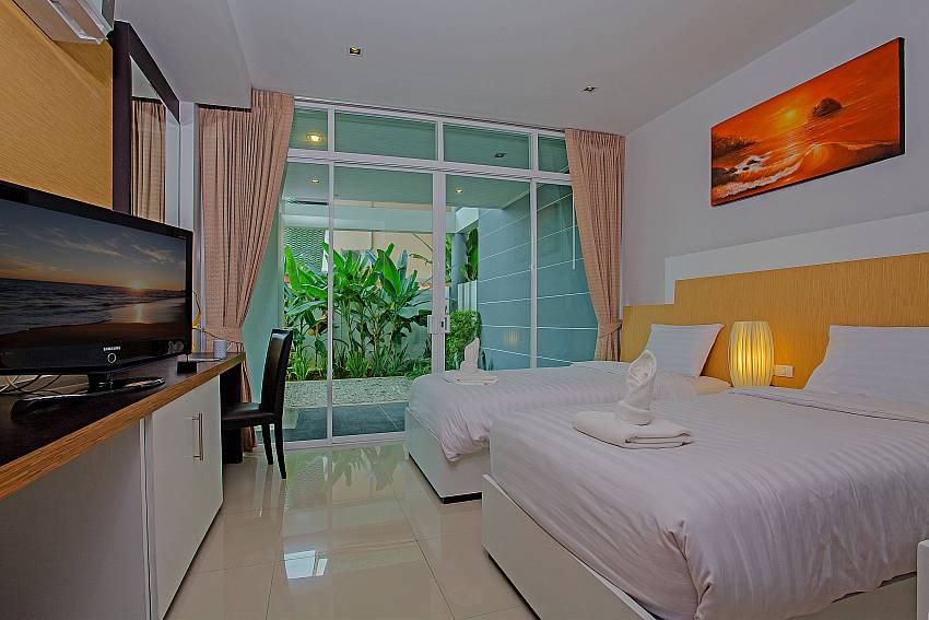 Double bedroom with TV of Kata Horizon Villa A1