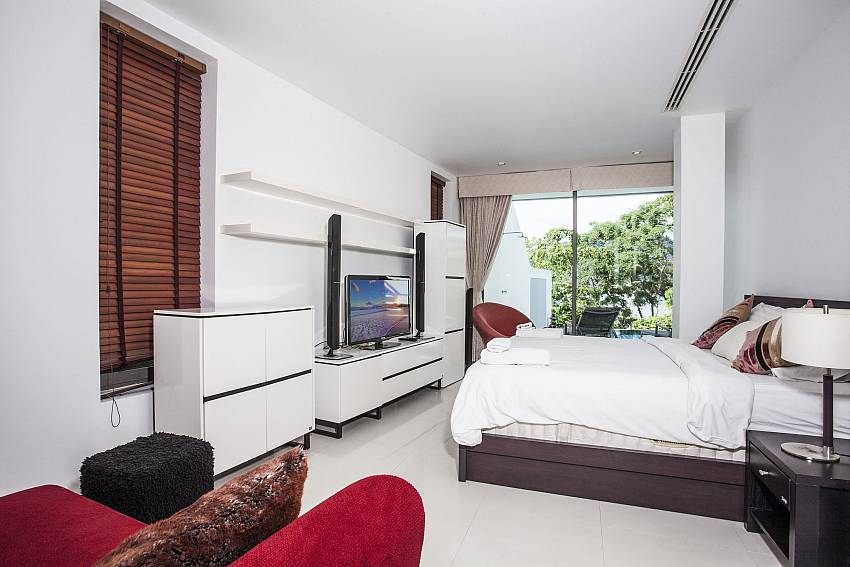 Bedroom with shelves and TV of Seductive Sunset Villa Patong A8