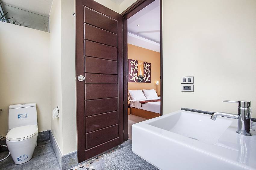 Toilet with basin wash in the bedroom of Villa Lipalia 204