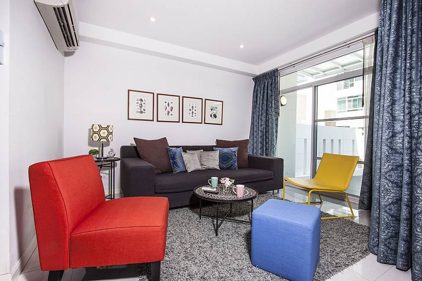 Living room with sofa vivid colors of Kannika Villa
