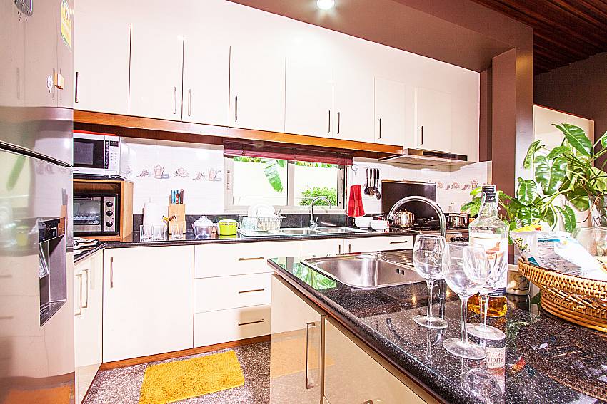 Kitchen room of Pensri Villa