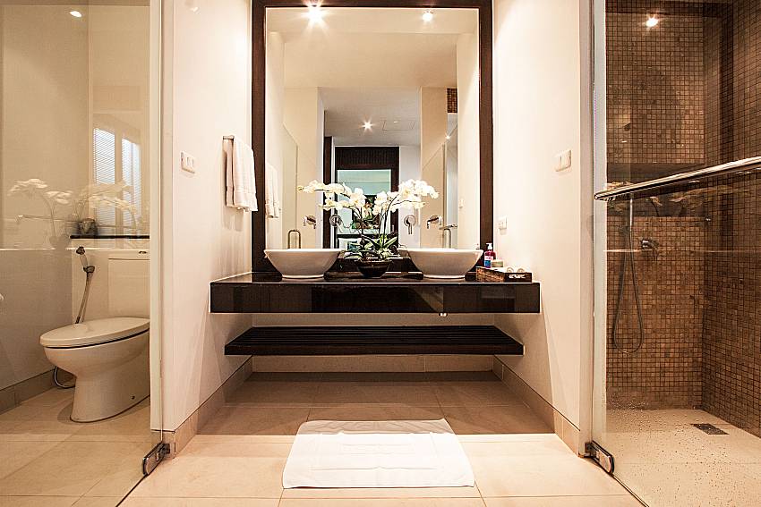 Bathroom with toilet and basin wash of Churai Condo
