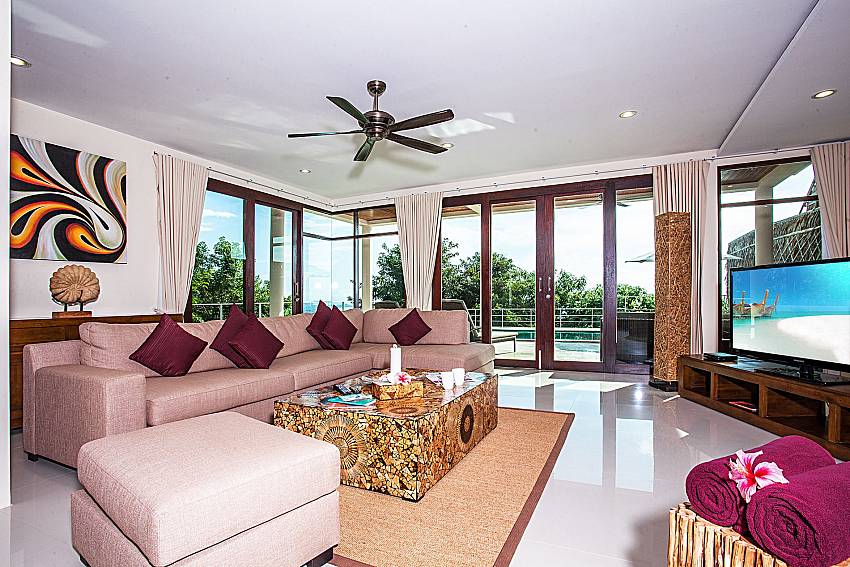 Living room overlooking outside of Baan Phu Kaew C6